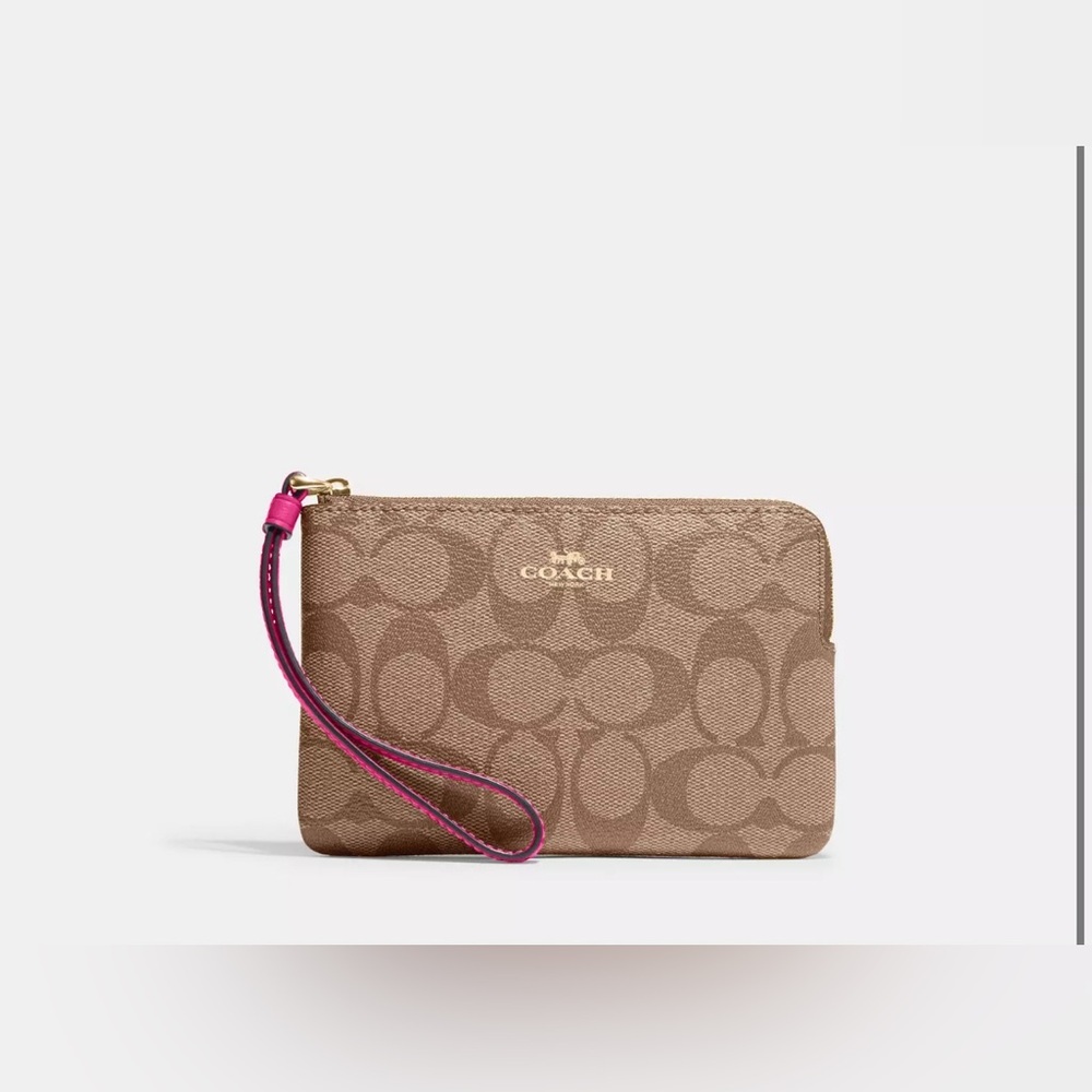 Coach Corner Zip Wristlet In Signature Canvas